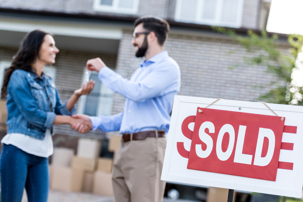 Paramount Bank Home Buyers Flock in COVID-19 Market House For Sale Sold Sign Happy